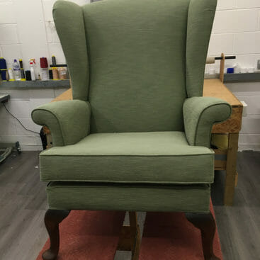 parker knoll chair in green fabric